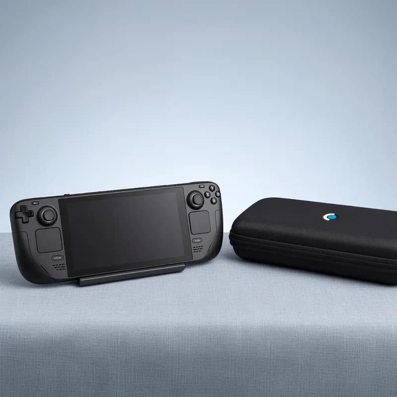The console on a stand beside its zip carrying case on a linen-covered table